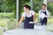 2 waiters setting table in fancy restaurant