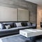 20 A contemporary, minimalist living room with a mix of white and black finishes, a low-profile sectional sofa, and a large, abs