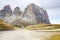 20 cot. 2016. Sign with the logo of Val Gardena Valley on the road, seen from Passo Sella