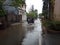 20 February 2021, Motorcyle acrossing Flooding small street at Condet East Jakarta, Indonesia