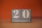 20 Januar on wooden grey cubes. Calendar cube date 20 January. Concept of date. Copy space for text. Educational cubes