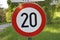 20 kilometers per hour speed limit sign