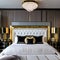 20 A luxurious, Hollywood Regency-inspired bedroom with a tufted headboard, mirrored furniture, and lots of gold accents4, Gener