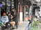 20 March 2019 - Beautiful ladies outside the Cafe del Volcan restaurant in Street of French Concession area of Shanghai, China