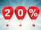 20% sale sign on red hot air balloons