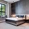 20 A transitional-style bedroom with a mix of neutral and metallic finishes, a low platform bed, and a mix of patterned and soli