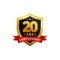 20 years anniversary golden shield badge logo with ribbon
