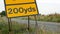 200 yards roadworks warning sign on UK motorway at evening with traffic passing