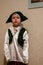 2010.11.28, Maloyaroslavets, Russia. A little boy wearing a pirate costume standing in the room.
