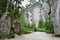 2015-07-10 Adrspach, Czech republic - sandy path between large rock formations with two tourists