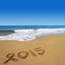 2015 written on beach