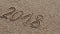 2016 2017 2018 new year written in sand, on tropical beach