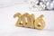 2016 year golden figures and silvery Christmas decorations