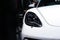 2017 NOVEMBER 03. TOKYO JAPAN. Front light of a new luxurious Porsche car, e-hybrid type at JAPAN MOTOR SHOW booth