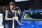 2017 November 03. TOKYO JAPAN. A pretty woman introducing new volkswagen car, Golf-R type at Tokyo motor show booth.