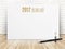 2017 To do list year text on white paper poster with black pencil and lightbulb on wood plank floor and white brick