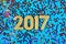 2017 year golden figures and varicolored confetti