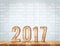 2017 Year wood texture on plank wood table top with white blur c