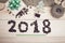 2018 coffee beans inscription, green decorations