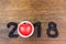 2018 coffee beans and red heart on wood