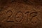 2018 inscription on sawdust .