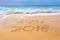 2018 written on the sand of a beach, travel new year concept