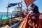 2019-04-17 Tourism Group Interesting Small Fisherman Boat in the Sea to Catch a Squid. Ranong Province, Thailand