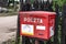 2019-06-22 Poland, Vintage polish red post box, polish village, old wall