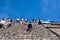 2019-11-25 Teotihuacan, Mexico. Tourists climb the steps of the moon pyramid.