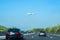 2019 Austria.Airplane flying over highway road.The plane flies over the road