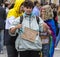 2019: A boy with a free kiss and free hugs sign attending the Gay Pride parade also known as Christopher Street Day CSD,Munich