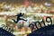 2019 brave man successful concept,silhouette man jumping over gap between building, city scape, landscape to 2019 new year, feel l