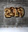 2019 Christmas inflatable gold numbers balloons on the loft wall background new year