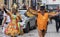 2019: An elderly couple in exquisite orange costumes attending the Gay Pride parade also known as Christopher Street Day,Munich