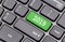 2019 on green enter key, of a black keyboard.