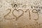 2019 written on the sea sand with heart shaped number 0