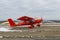 2020-02-09 Byshiv, Ukraine. Small red plane flies from local airfield