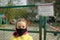 2020.04.18 Lviv, Ukraine. Kids play area locked because of Coronavirus social distance quarantine. Sad little girl in