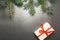 2020 Happy New Year, Merry Christmas decorations flatlay. Gift box, red ribbon spruce branch top view. Boxing Day banner