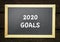 2020 new year goal, plan, action text on black board