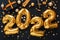 2022 balloon gold text on black background with golden confetti, Christmas gift boxes, gold balls, festive decor. Happy