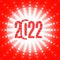 2022 New Year banner. Number 2022 in a retro style disco light on a red background. Bright creative design for greeting cards,