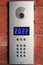 2022 number on the screen of the intercom, video and voice security system on entrance to the house in winter holidays eve.