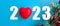2023 new year numbers and red heart on blue background