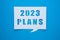 2023 plans text design with letter cutouts . Concept of business plans and strategies