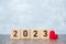 2023 wood cube block with red heart shape. Healthcare, health, Resolution, goal, New Year New You and Happy Valentine day holiday