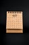 2024 August brown desk calendar on black
