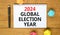 2024 global election year symbol. Concept words 2024 global election year on beautiful white note. Beautiful wooden table