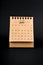 2024 June brown desk calendar on black