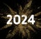 2024 New Year banner on gold glitter powder explosion. Golden color dust splash